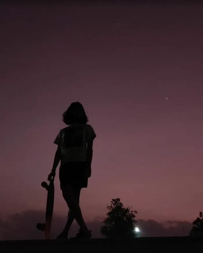 Skateboarder silhouette at dusk